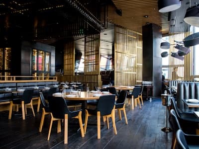 Restaurant interior with professional security presence