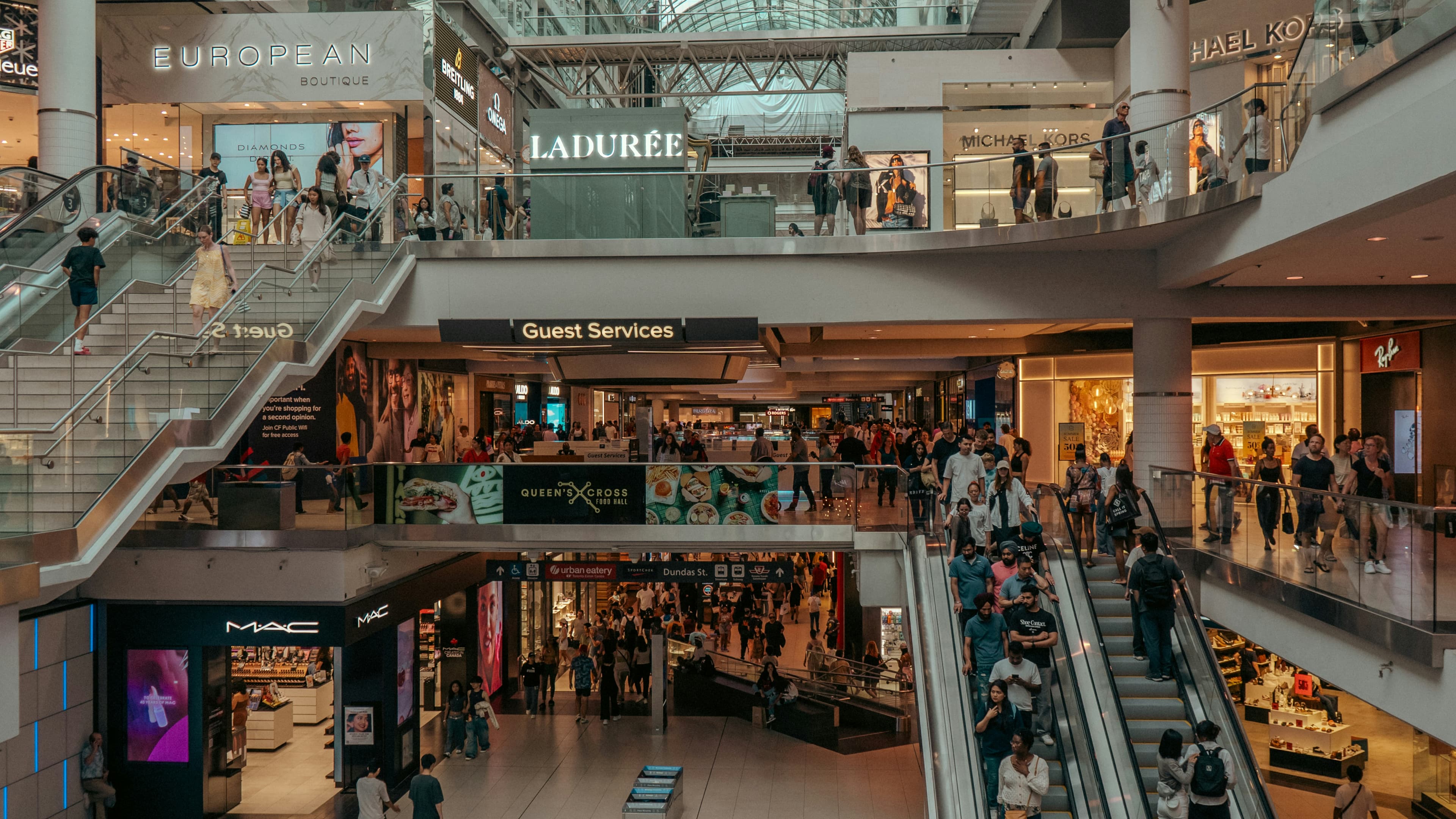 Outdoor shopping center with visible security patrol